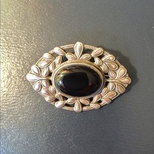 Sterling silver, onyx brooch